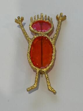 Gripoix Figural Brooch Stick Figure Gold Tone Orange Glass